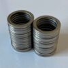 Two stacks of Pedal Spacer Washers on a white surface.