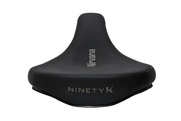 Black bicycle saddle with the brand name "Nirvana K" and the logo "ninetyk" displayed, isolated on a white background.