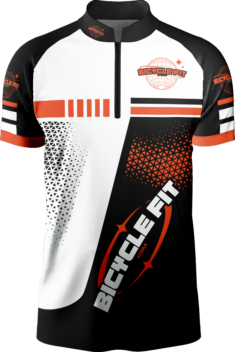 A black and orange jersey with the word bicyclefit.com on it.